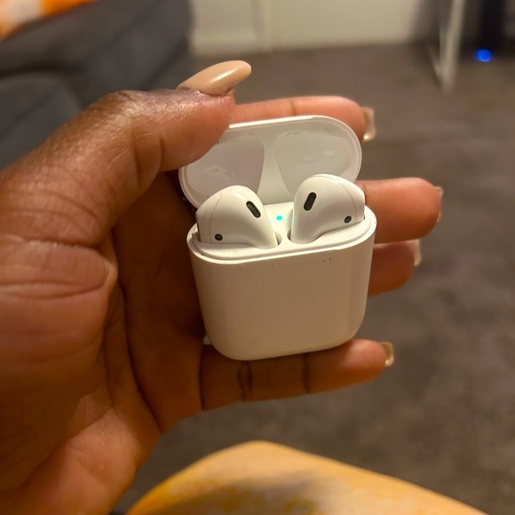 AirPods 2nd generation w/ charging case. Comes in original box with charger.